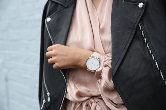 woman wearing fashion watch