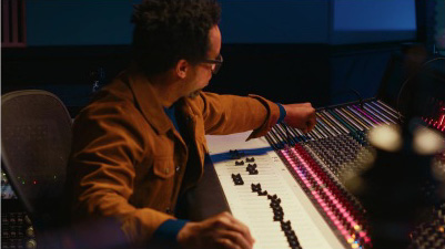 music producer at sound board